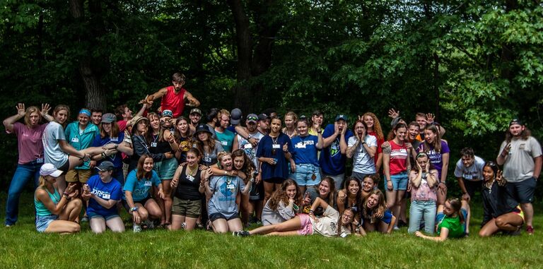 We met working as Cabin Leaders at Camp Timber-Lee in Southern Wisconsin summer of 2021. This is the staff photo at the beginning of that year, and the first time we were ever in the same picture. 