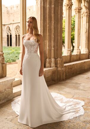 Straight silhouette wedding dress with lace bodice and round neckline. Open back, tie straps. Stretch crepe skirt.