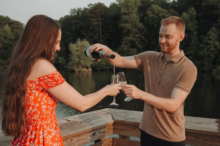 Cheers! Alex & Jake finalize their wedding details. They cannot wait to celebrate their special day with you!