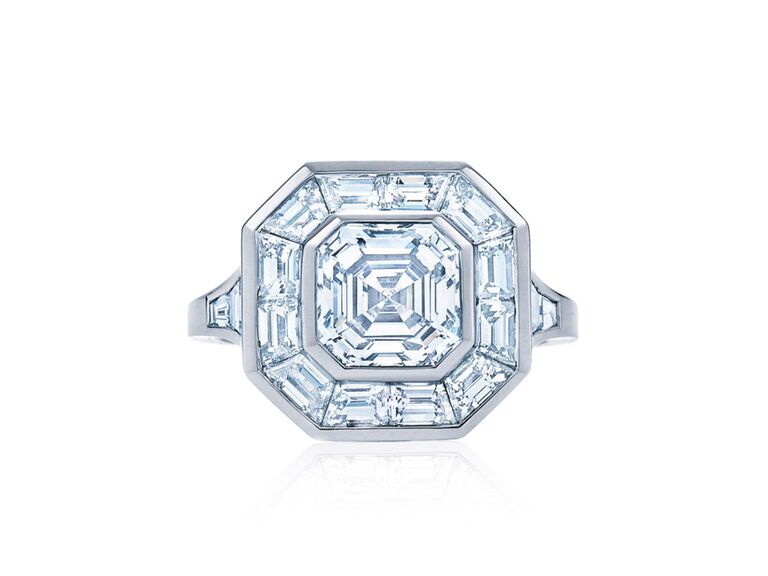 kwiat asscher cut engagement ring with diamond center stone white gold diamond encrusted bezel-set halo diamond encrusted sides and plain white gold band
