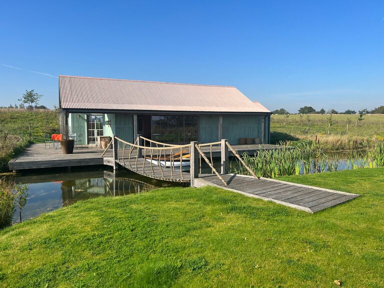 Earlier in the year Scott booked a trip to Wilderness reserve, a secret he kept right up to the arrival. Even in the car journey Jess had no idea where the couple was going. 
The couple arrived to the most beautiful estate and their own cabin equipped with an island, rowing boat and Hottub. Honestly it was the stuff of dreams!