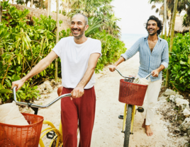 Couple biking on romantic weekend getaway in Mexico