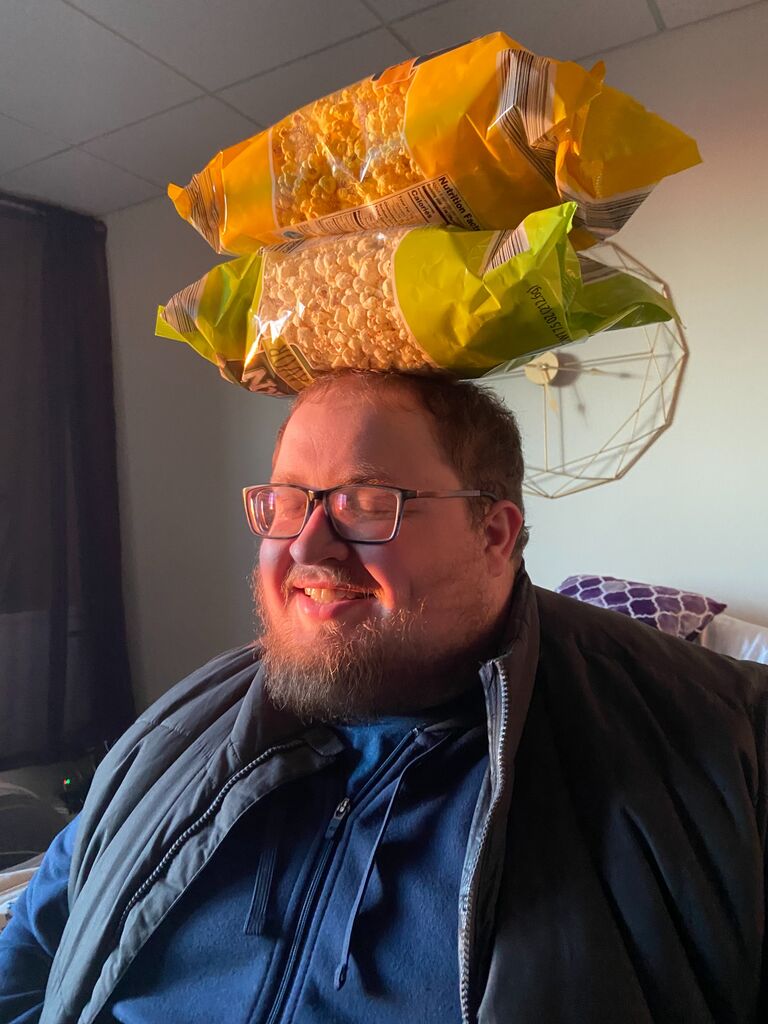 If you've never seen Adam's party trick, I recommend you ask him to balance something on his head the next time you see him. His composure is impeccable!