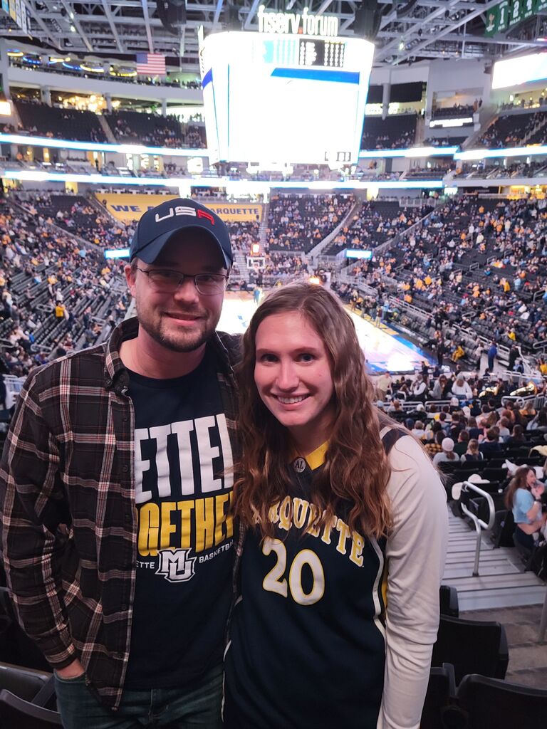The couple enjoys attending sporting events together, especially Marquette games!