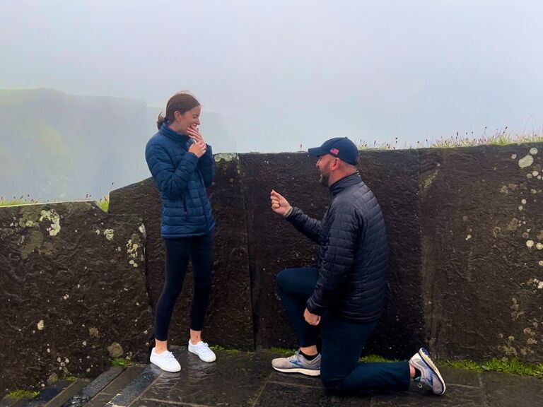 Matt pops the big question at the Cliffs of Moher on a beautiful and sunny Irish day.