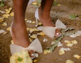 whimsical bow-topped bridal heels for one of the best wedding shoes for brides