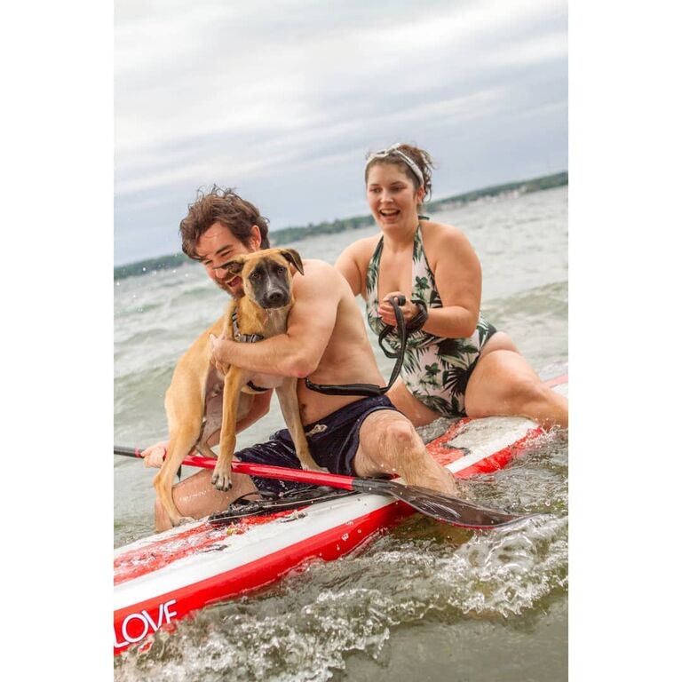 Maren and Matt visited The River to celebrate Grandpa Cutie's 80th birthday party! And brought a terrified Odin out on a paddle board for this photo.