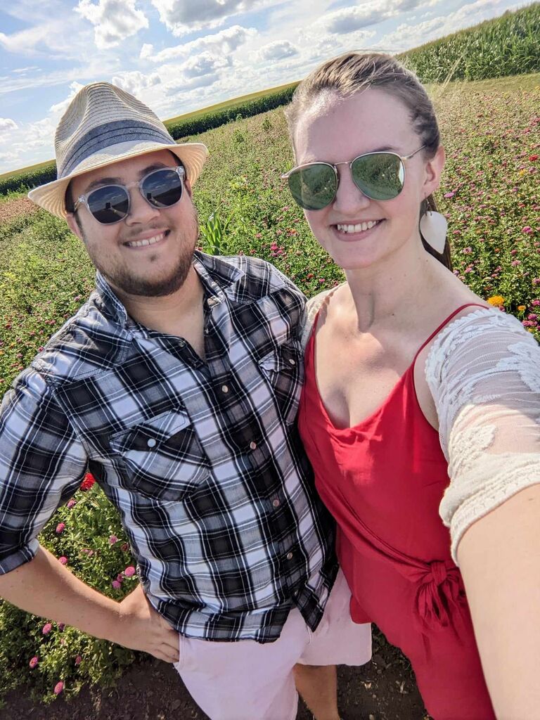 Frolicking through fields of flowers. By this time, David had not-so-slyly asked what Becca's ring size was and he had already asked her parents' permission to marry her.