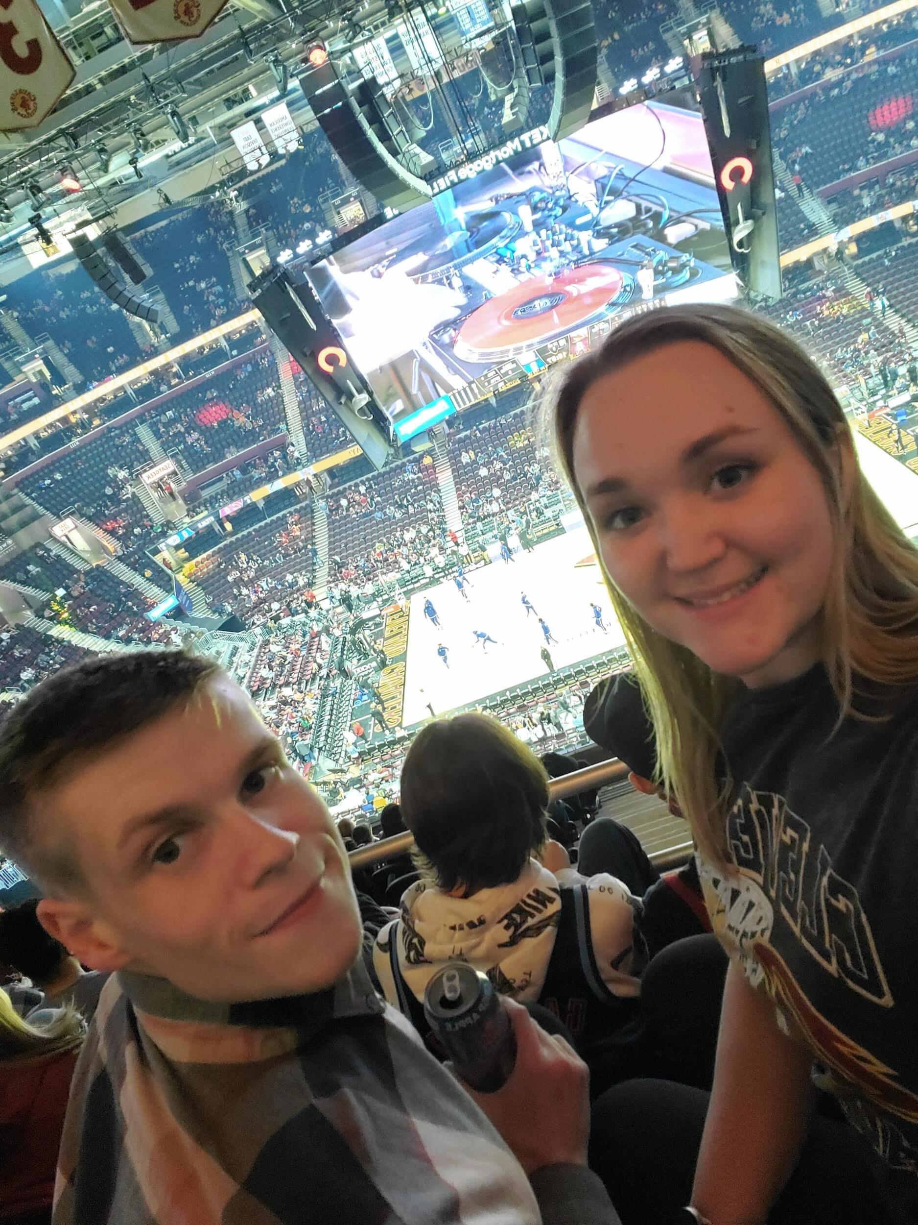 Emily and Kevin attend an NBA game between the Cleveland Cavaliers and the Philadelphia 76ers. 