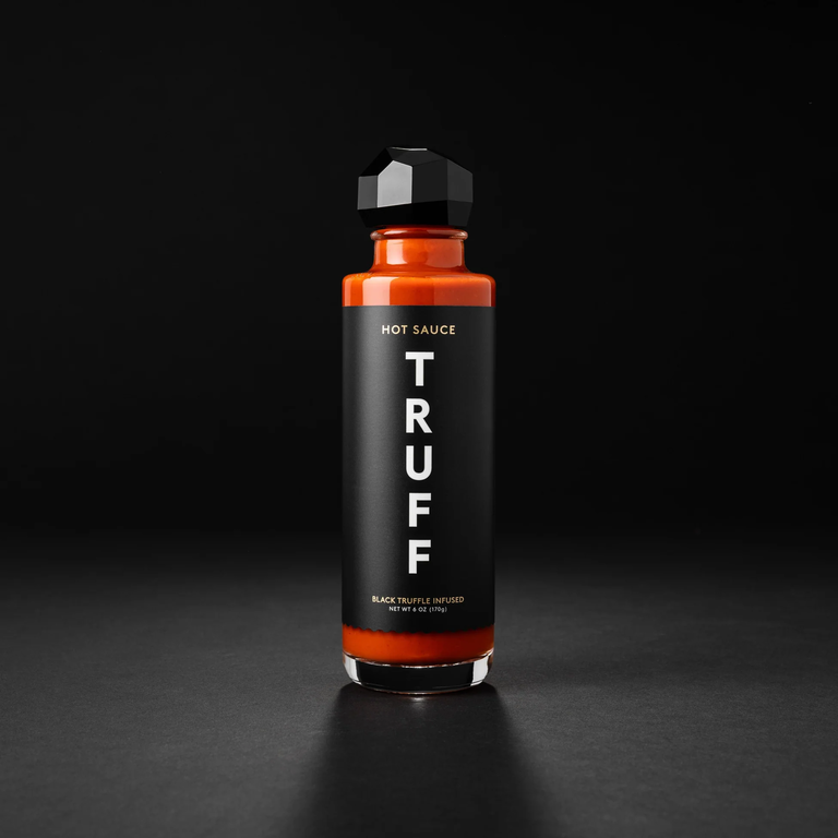 TRUFF Hot Sauce bottle on black background