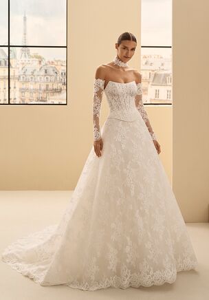 Two-piece wedding dress, A-line silhouette, sweetheart neckline, removable long sleeves, beaded lace, corset closure. Includes beaded lace choker. Voluminous skirt.