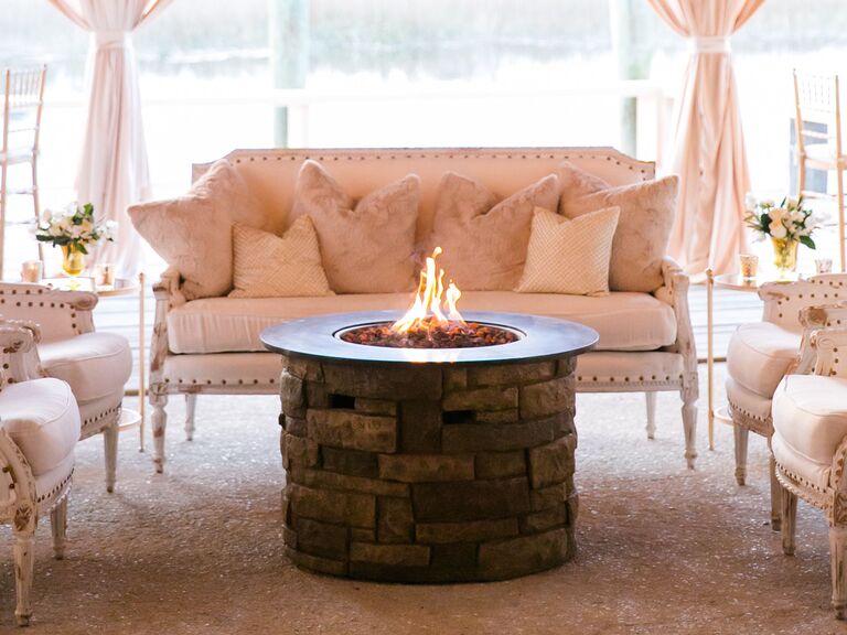 wedding reception lounge area with fire pit