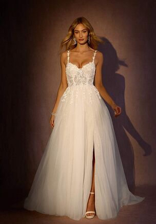 Celebrate a memorable day in our Florian bridal gown. She features an illusion tulle bodice and V neckline embellished with lace and handmade beading. The look is complete with an A line skirt and chapel length train.