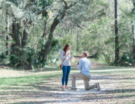 Man proposing to woman at Laurel Hill County Park in Charleston, South Carolina