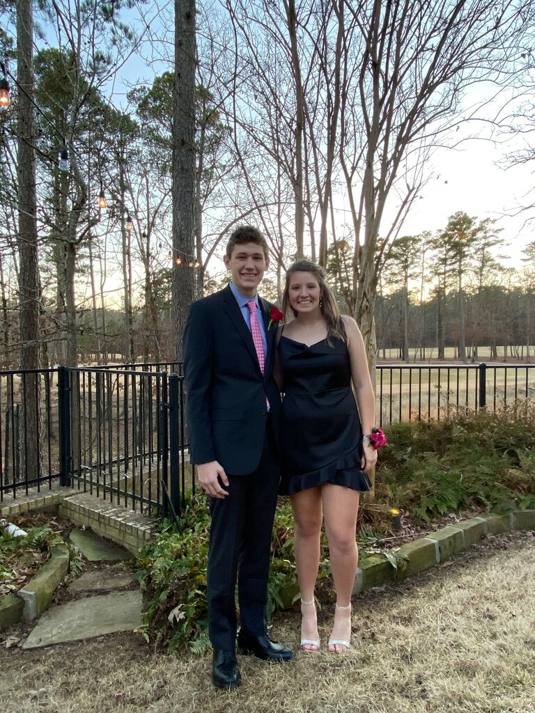 Where it all started. Piper asked Garland to LRCA formal in December 2019. After hesitation, he said yes. Fun fact: Also in December, Piper and her friends were talking about Garland after he served them their Chick-Fil-A, and she looked at them and said, "I am going to marry that man one day."