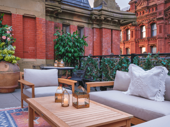 A sitting area outside at The Beekman Hotel.