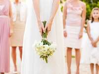 Bride throwing bouquet