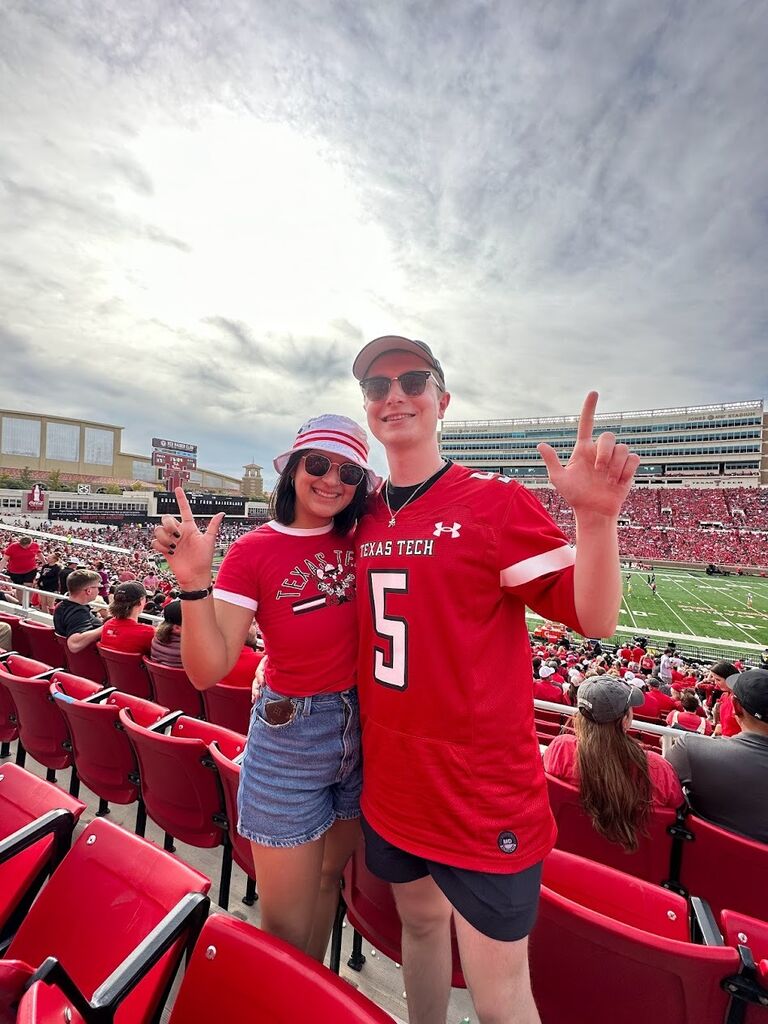 JT and Lucy at a Texas Tech Football Game. 