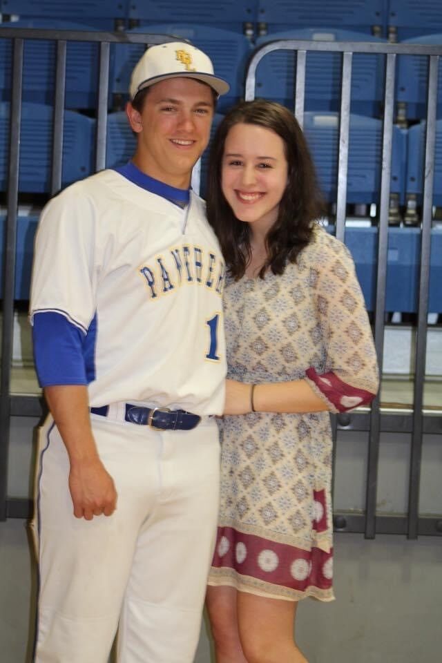 One was sporty, one was musical, but we both went to each others' events and cheered the other one on. This picture is from our spring band concert in 2018, when Ben came to watch after a baseball game.
