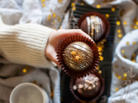 Hot cocoa bombs set with edible gold star decorations