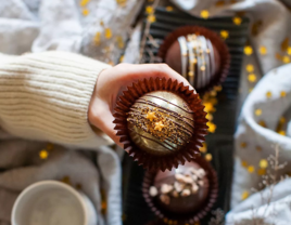 Hot cocoa bombs set with edible gold star decorations