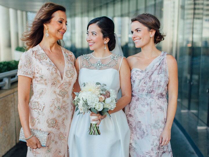 Bride, mother of the bride and bridesmaid