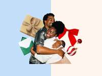 Couple hugging surrounded by holiday gifts