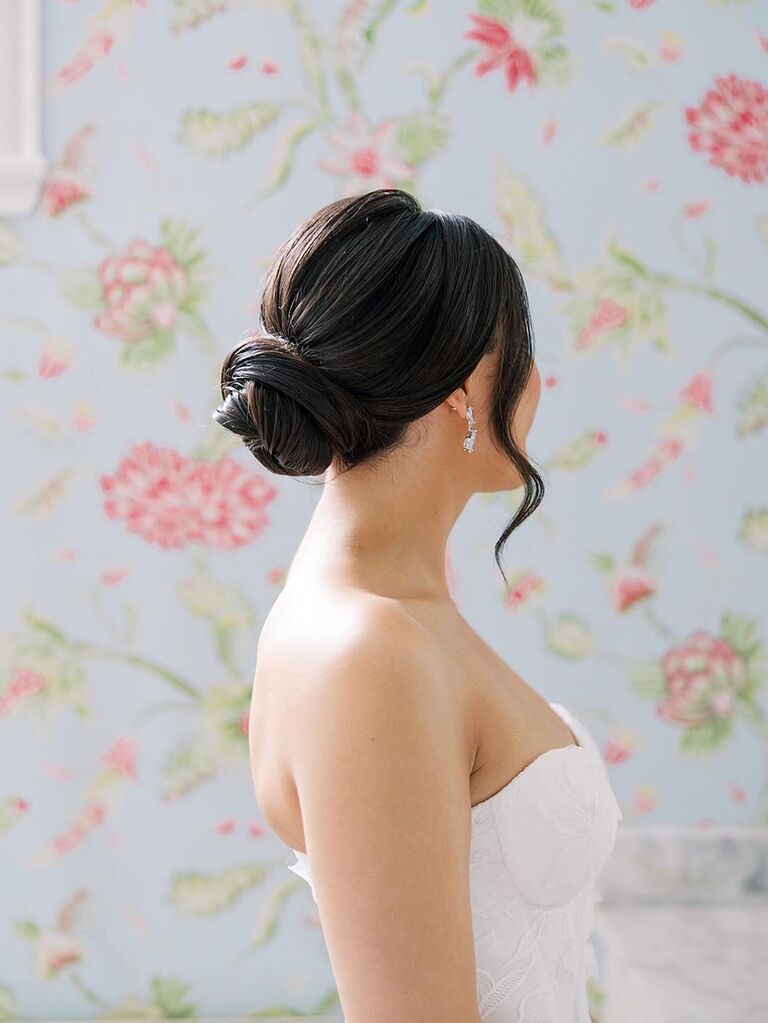Clean knotted bun wedding updo for long hair