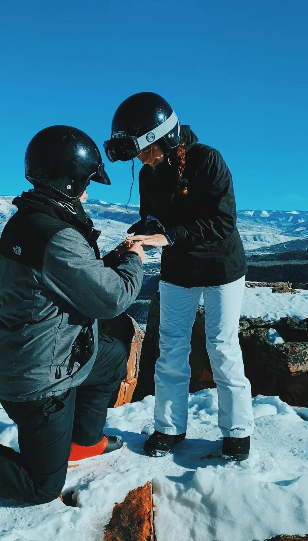 The couple went on a ski trip and one of the days they went on a snowmobiling excursion. At the top of the mountain, Grayson asked Hailey if she would like to spend the rest of her life with him. She said yes and the rest is history!