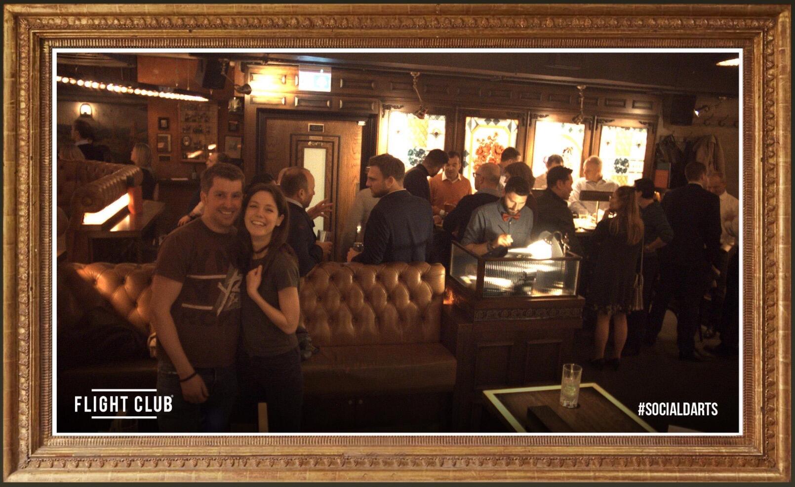 The first picture we ever took together - playing darts in London!