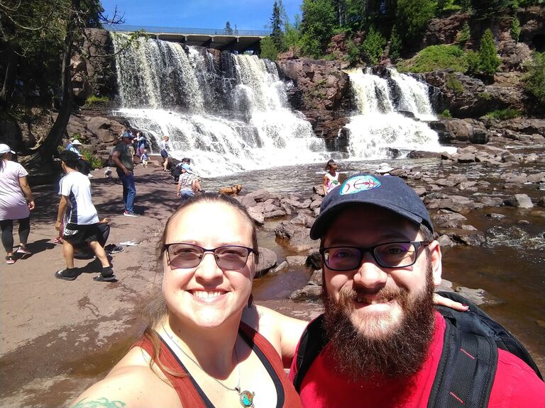 From there, the couple took turns traveling to and fro -- here, a waterfall in Minnesota...