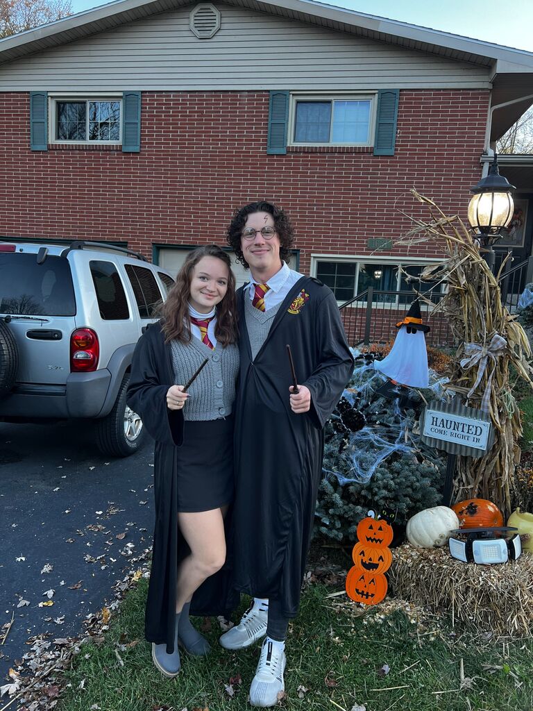 Dressing up as Hermione and Harry for Halloween. Mattie's dog Prince was a bumble bee and he loved helping hand out candy!