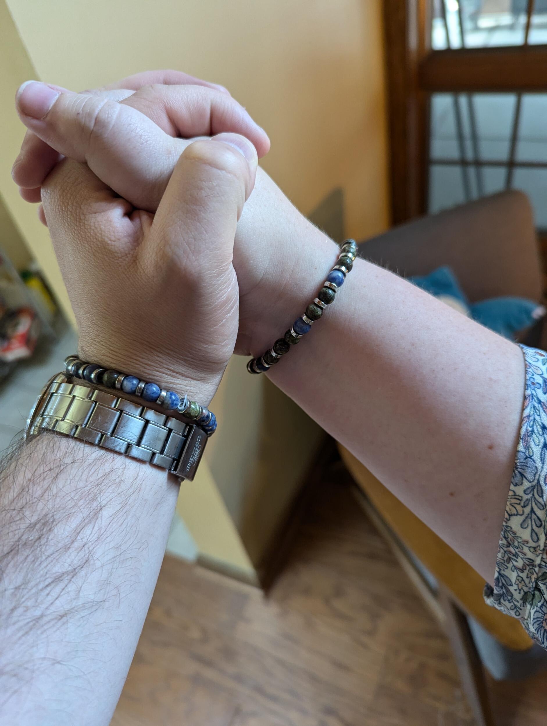 Matching eye color bracelets. 