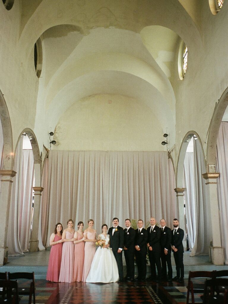 Film wedding photography of wedding party posting in ceremony space