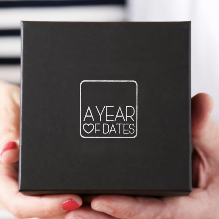 Date night question cards in black box titled 'a year of dates' for 29th anniversary gift