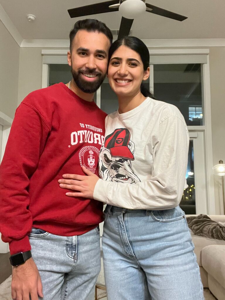 We generally saw each other once a month. This is a photo a few months into dating where Sundeep came to visit during New Years and we rang in the new year watching the Dawgs