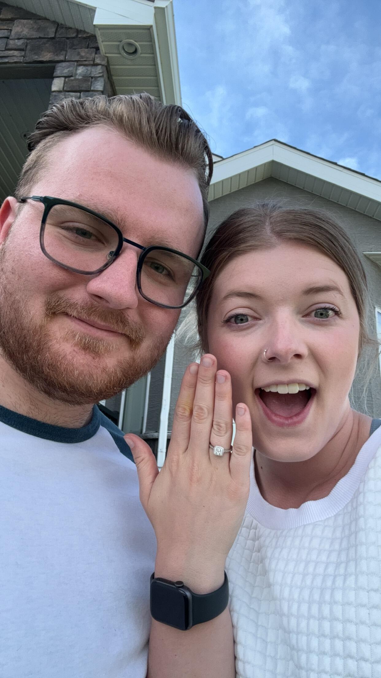 All it took was 10 years of being best friends and 5.5 as boyfriend and girlfriend for Brett to "Upgrade" his subscription to Fiancee.  The RING is PERFECT!

Brett proposed on Range Road 2230 (Our anniversary date) just outside of Fulda, SK. Number 13 is also his lucky number so he just knew it had to be on this day. 