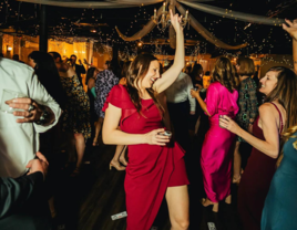 Woman dancing at wedding reception with music by Your Wedding Magic, Asheville wedding DJ