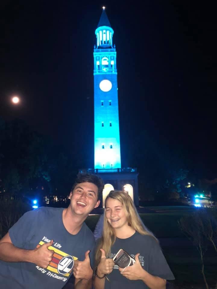 Kayley (Morgan's sister) and Simon happy at the UNC Bell Tower. 