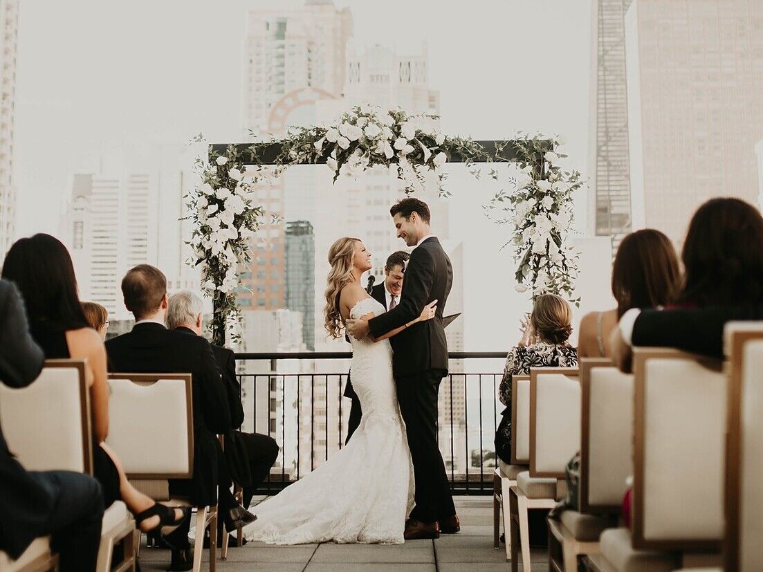Couple exchanging their vows on a rooftop