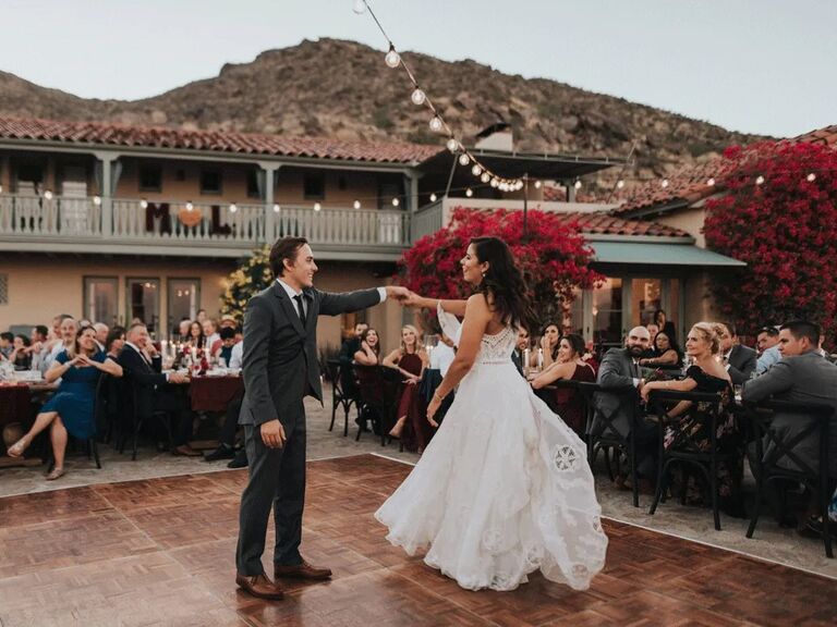 Couple dancing at outdoor wedding