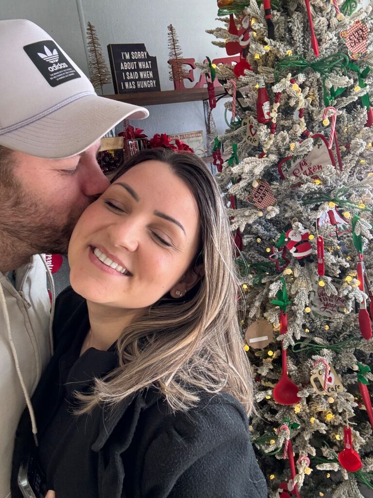 First pic next to a Christmas Tree