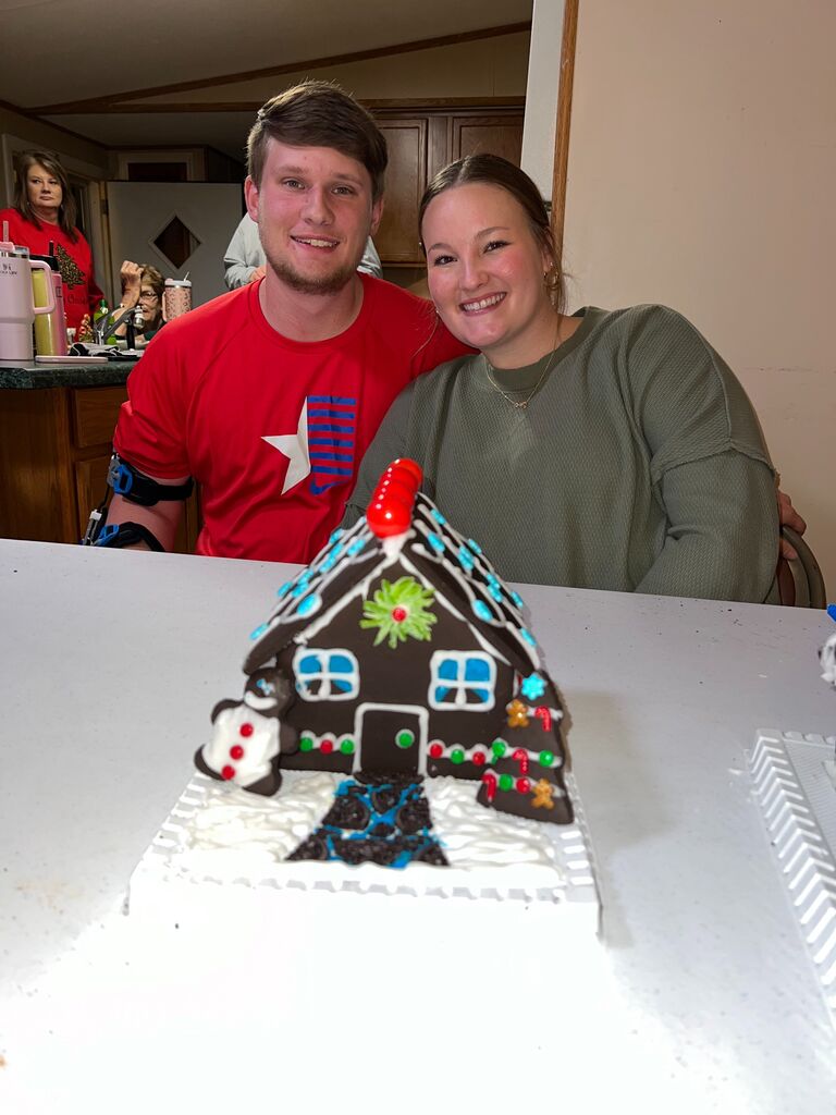 Our second Christmas together, and of course we were gingerbread house building champions