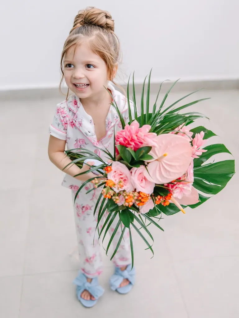 Flower Girl With Tropical Bouquet With Pink Anthurium and Monstera Leaf