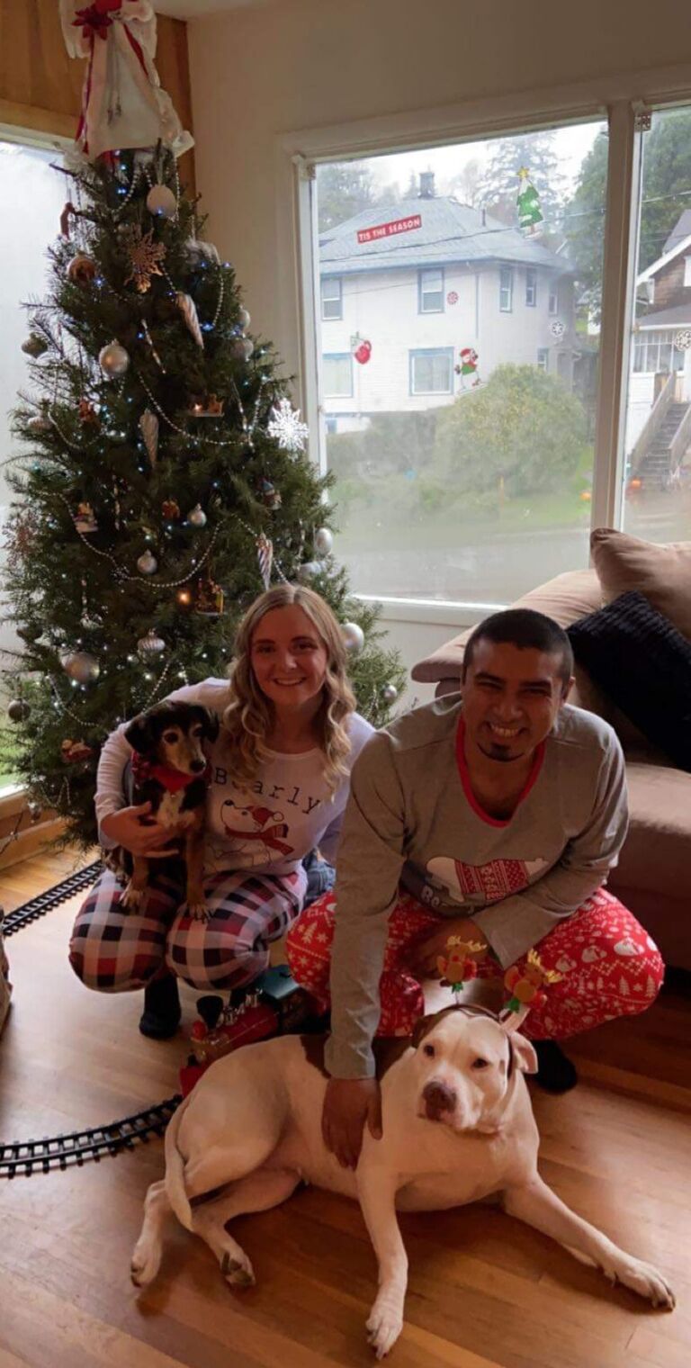 Family Christmas picture 2021, missing the cat Loki. He was not having it!