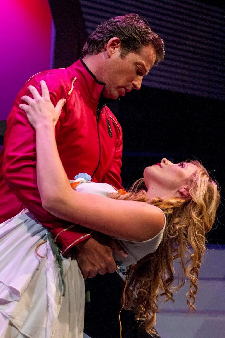 Kelly and David meet performing as romantic opposites in a quirky little musical called Return to the Forbidden Planet at New Village Arts Theatre in Carlsbad, CA.