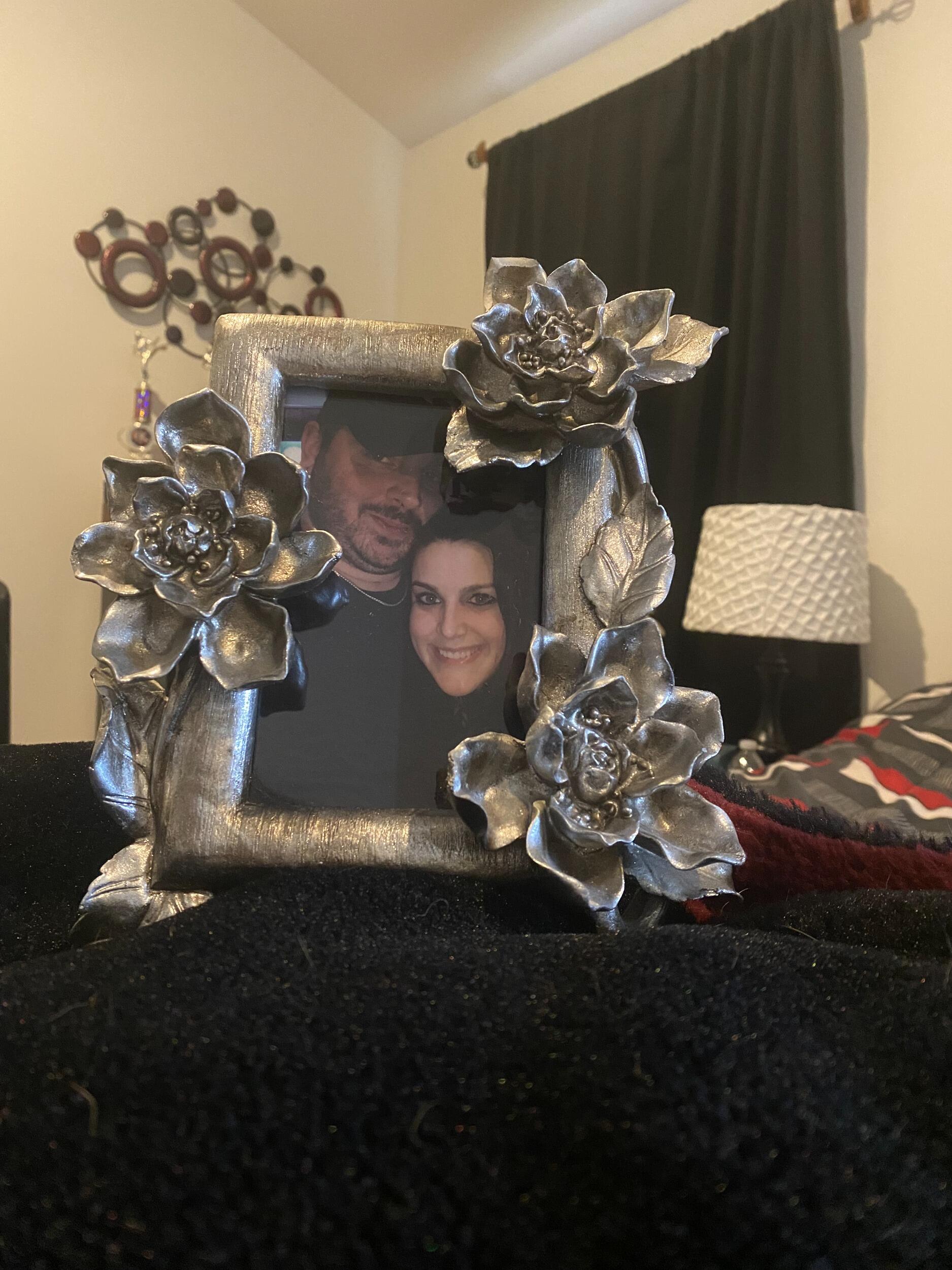 After a few months, Cory decided to make their relationship official. Cory asked, "Do you want this picture frame to have a photo of us?" With everyone else around them confused, Kelsi knew exactly what that question meant, and needed no hesitation to say, "YES!"

Backstory - Taylor gave Kelsi a beautiful, ornate picture frame as a gift. Upon opening the gift, Kelsi thought, "This is the perfect picture frame for a photo of my human and me." At the time, not having a human, Kelsi left the frame empty on her nightstand. During Cory's first visit to Hershey, Cory asked Kelsi why she had an empty frame on her nightstand. Coincidentally, Cory had an equally meaningful empty frame waiting for the same picture.
