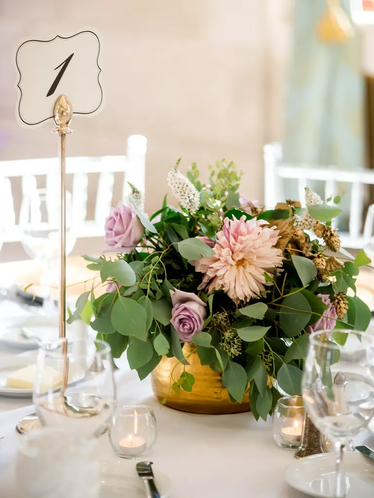 Romantic Low Centerpieces of Roses, Eucalyptus, Dahlias and Gold-Painted Hops