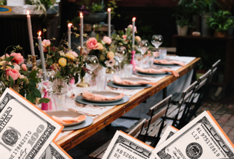 A couple lean in together, smiling, at this outdoor rehearsal dinner.