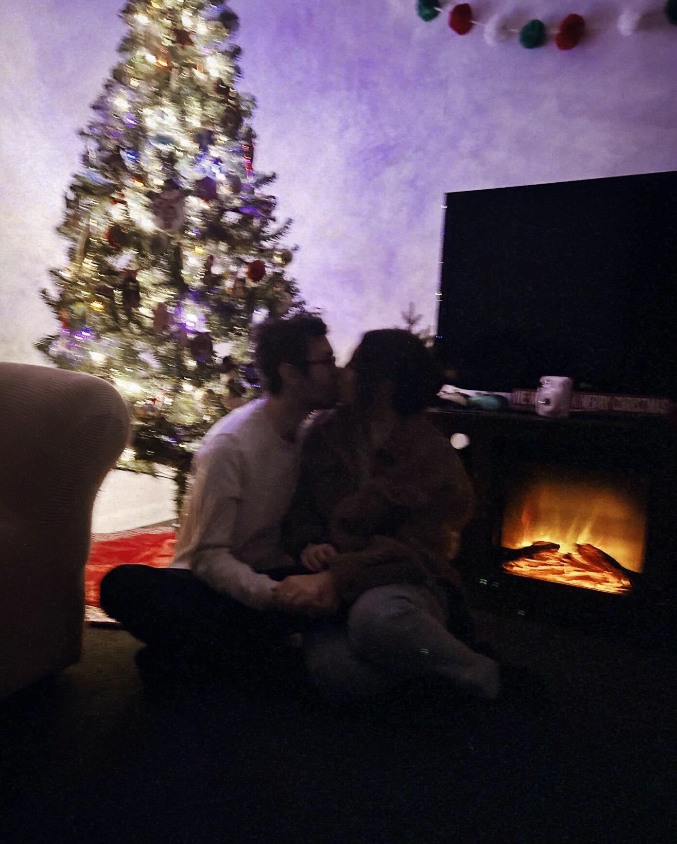 Almost 5 and a half years later, during Christmas Eve Pollyanna, Sean & Sam got engaged! After countless teasing once they knew engagement was in their future; Sean tricked Sam into thinking he'd propose in the spring or summer. Somehow Sean smuggled this ring in the tiniest jean pocket to Sam's brothers house. He secretly informed Dom & Richie about his plan so it could be caught on camera. To her surprise, Sean proposed surrounded by Sam's older sister, older brother, mother, aunt, cousin, sister-in-law, brother-in-law, three nieces, and one nephew. Whatta guy.